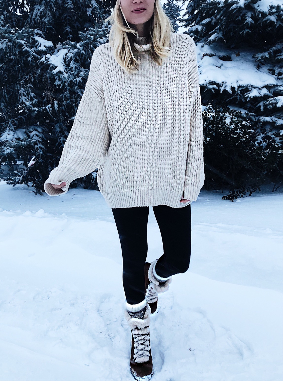 neutral cream sweater leggings snow boots